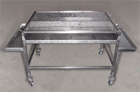 Griglia per barbecue in acciaio inox con piano fuoco regolabile in altezza

